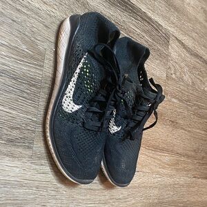 Nike Women's Black and White Knit Sneakers